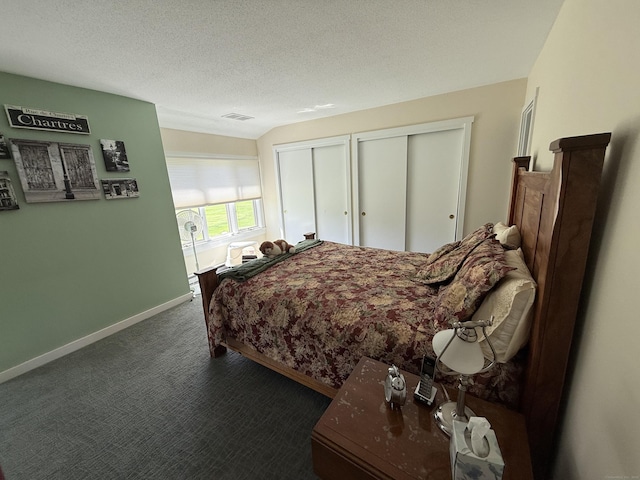 15 Pilgrim Hbr Unit A, Wallingford, CT 06492 - carpeted bedroom with multiple closets, baseboards, and a textured ceiling