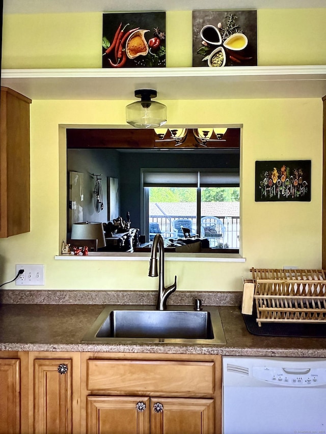 15 Pilgrim Hbr Unit A, Wallingford, CT 06492 - kitchen with white dishwasher, a sink, and dark countertops
