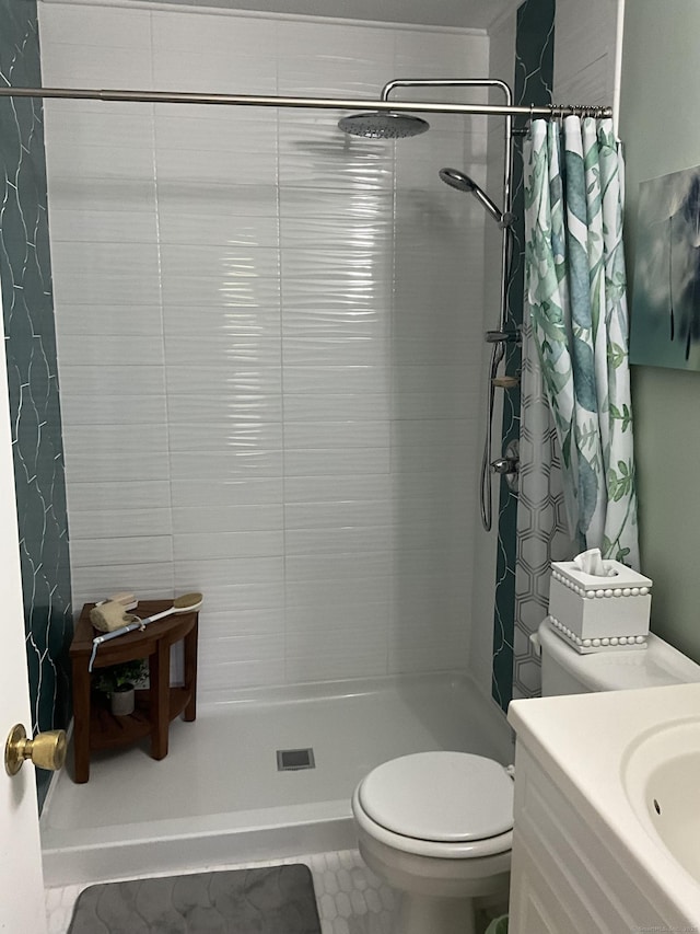 15 Pilgrim Hbr Unit A, Wallingford, CT 06492 - bathroom featuring vanity, tiled shower, toilet, and tile patterned flooring