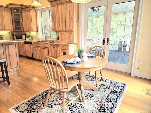21 Autumn Cir, Rocky Hill, CT 06067 - dining area featuring light wood-style floors, french doors, and baseboards