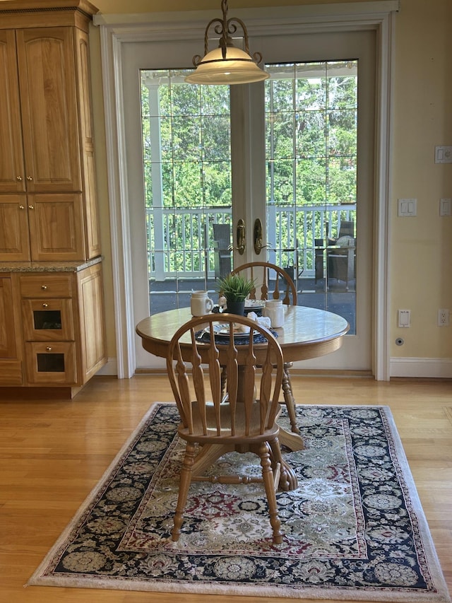 21 Autumn Cir, Rocky Hill, CT 06067 - dining area featuring light wood-style flooring, healthy amount of natural light, and baseboards