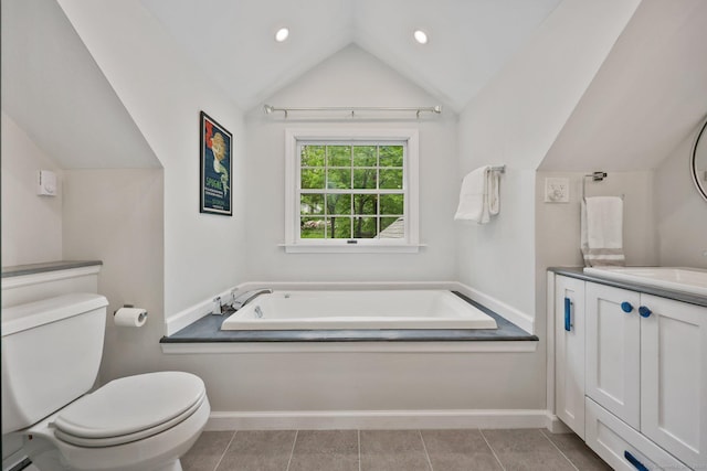 full bathroom with toilet, vaulted ceiling, baseboards, a bath, and vanity