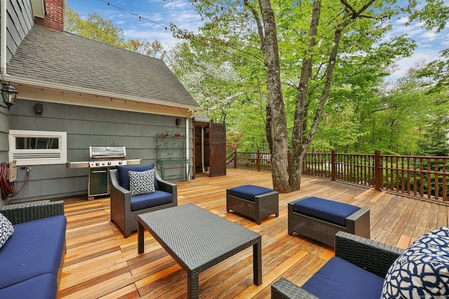 wooden deck with area for grilling