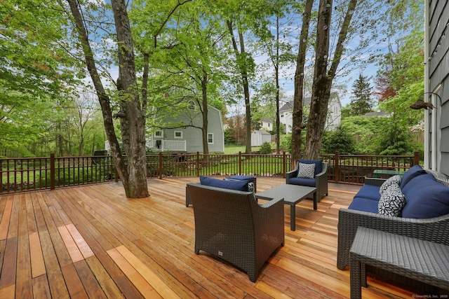 wooden deck with an outdoor hangout area