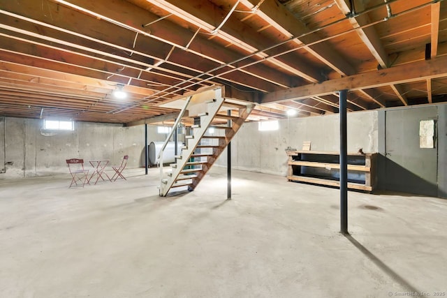 basement with stairway and heating fuel