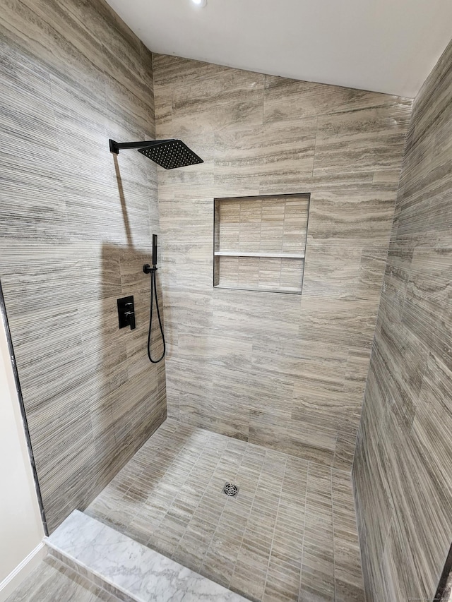 154 Falls Rd, East Haddam, CT 06469 - bathroom featuring tiled shower and vaulted ceiling