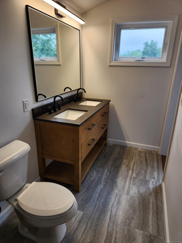 154 Falls Rd, East Haddam, CT 06469 - bathroom featuring wood finished floors and double vanity