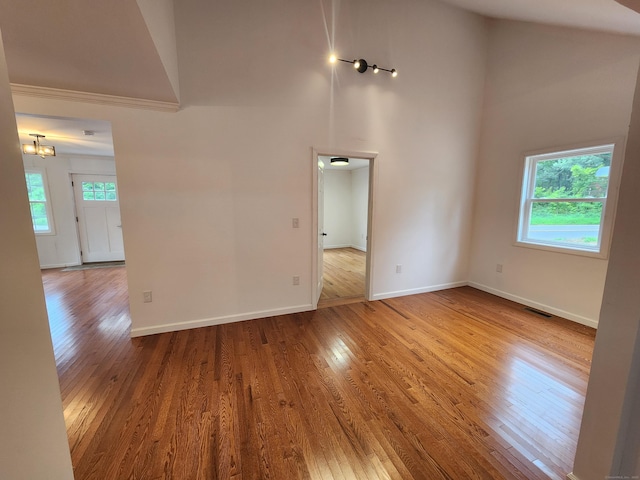 154 Falls Rd, East Haddam, CT 06469 - unfurnished room with a towering ceiling and wood finished floors