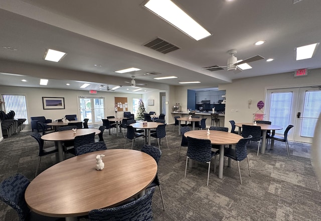 carpeted dining area with visible vents, baseboards, recessed lighting, french doors, and a ceiling fan
