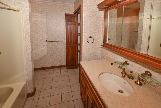 full bath featuring baseboards, vanity, and wallpapered walls