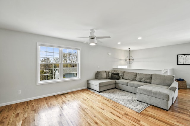 10 Bidwell Ter, Middletown, CT 06457 - living area with baseboards, wood finished floors, and visible vents