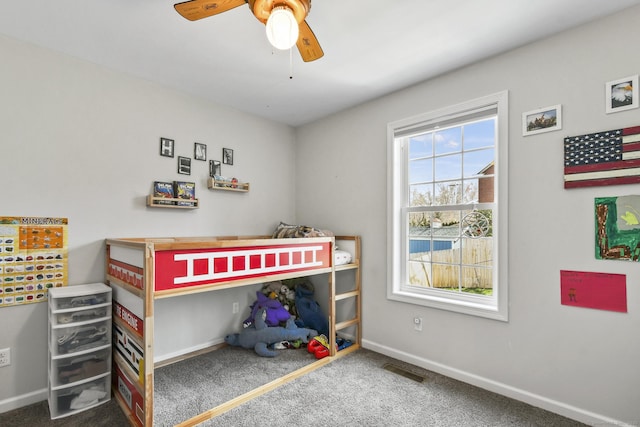 10 Bidwell Ter, Middletown, CT 06457 - bedroom with baseboards, a ceiling fan, and carpet