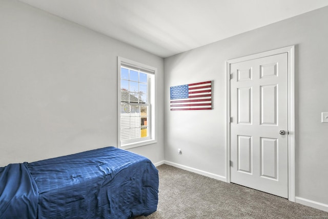 10 Bidwell Ter, Middletown, CT 06457 - carpeted bedroom featuring baseboards