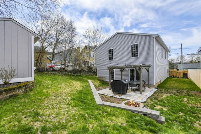 10 Bidwell Ter, Middletown, CT 06457 - back of house with a fenced backyard, a pergola, a patio area, a yard, and an outdoor fire pit