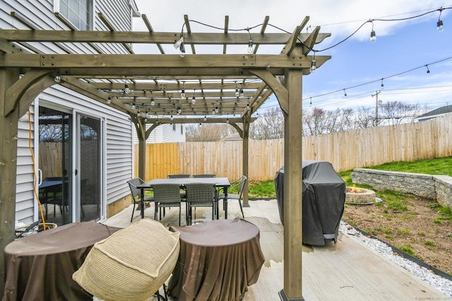 10 Bidwell Ter, Middletown, CT 06457 - view of patio featuring outdoor dining area, an outdoor fire pit, a fenced backyard, and area for grilling