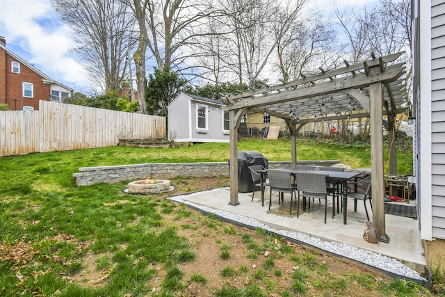 10 Bidwell Ter, Middletown, CT 06457 - view of yard featuring a pergola, a fire pit, a fenced backyard, an outbuilding, and a patio