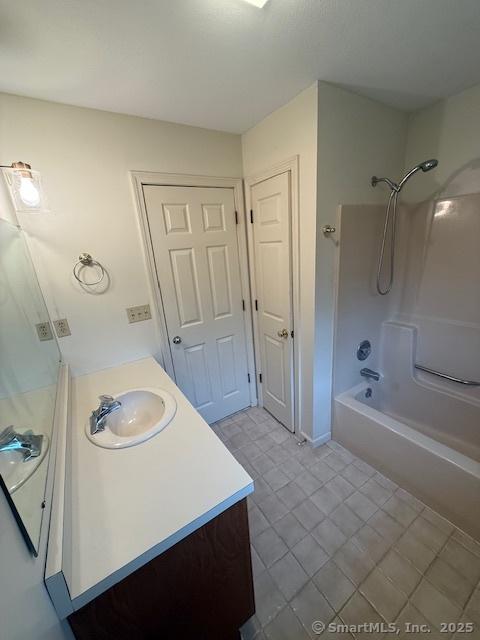 1900 Litchfield Rd, Watertown, CT 06795 - full bath featuring vanity, shower / bath combination, and tile patterned floors