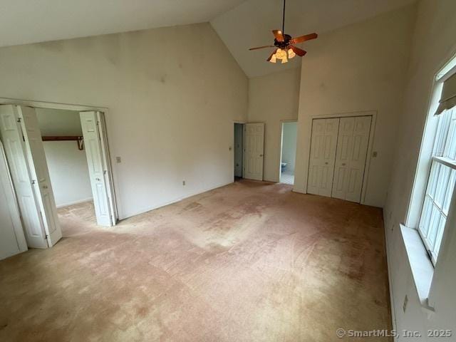 1900 Litchfield Rd, Watertown, CT 06795 - unfurnished bedroom with high vaulted ceiling, carpet floors, two closets, and ceiling fan