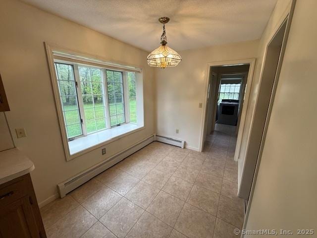 1900 Litchfield Rd, Watertown, CT 06795 - unfurnished dining area featuring a chandelier, baseboard heating, light tile patterned floors, a baseboard heating unit, and baseboards