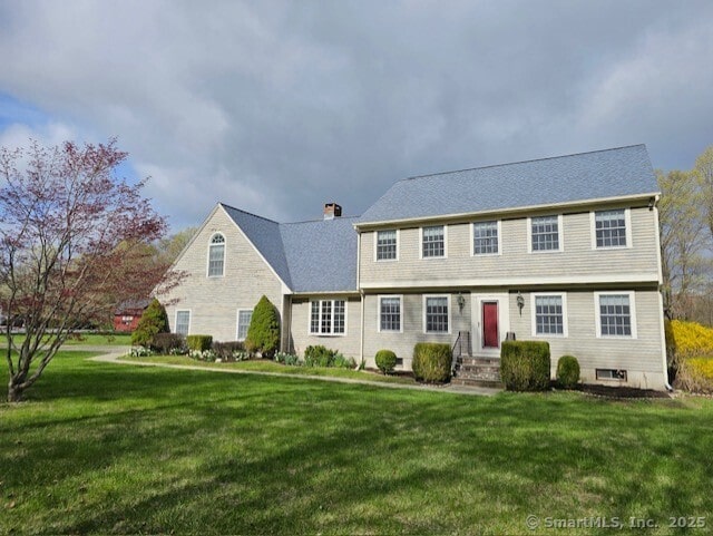 1900 Litchfield Rd, Watertown, CT 06795 - colonial-style house featuring a front yard and a chimney