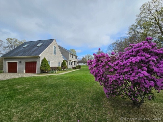 1900 Litchfield Rd, Watertown, CT 06795 - view of side of property with a lawn, driveway, and a garage