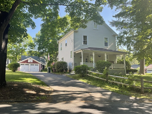 26 Seminary Rd, Simsbury, CT 06070 - view of front of house with a detached garage and covered porch
