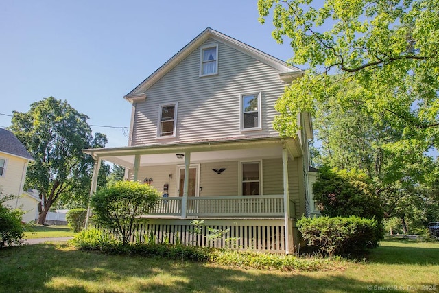 26 Seminary Rd, Simsbury, CT 06070 - view of front of property with a porch and a front yard