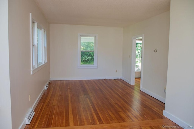 26 Seminary Rd, Simsbury, CT 06070 - spare room featuring wood finished floors and baseboards