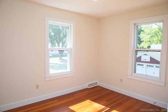 26 Seminary Rd, Simsbury, CT 06070 - empty room with baseboards and dark wood-style flooring