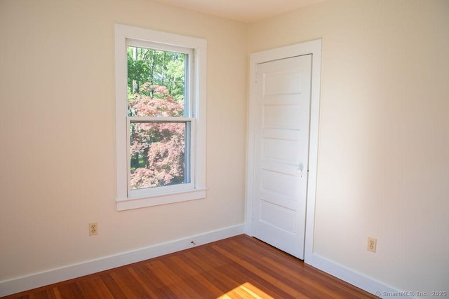 26 Seminary Rd, Simsbury, CT 06070 - spare room with dark wood-style flooring and baseboards