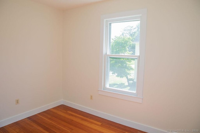 26 Seminary Rd, Simsbury, CT 06070 - unfurnished room with healthy amount of natural light and wood finished floors