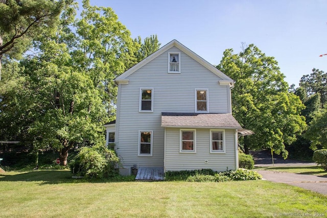 26 Seminary Rd, Simsbury, CT 06070 - view of side of property featuring a lawn