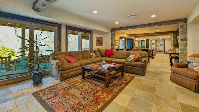 224 Tepi Dr, Southbury, CT 06488 - living room with recessed lighting, visible vents, and stone tile flooring
