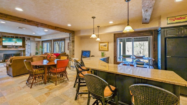 224 Tepi Dr, Southbury, CT 06488 - bar with recessed lighting, freestanding refrigerator, decorative light fixtures, and beam ceiling