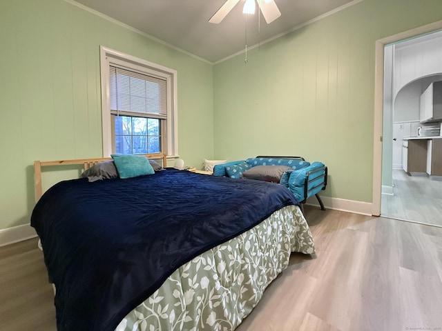 2811 Fairfield Ave Unit 1, Bridgeport, CT 06605 - bedroom with wood finished floors, ornamental molding, baseboards, and a ceiling fan