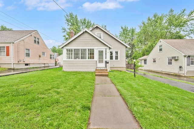 134 Saint Charles St, West Hartford, CT 06119 - bungalow-style house with a chimney and a front yard
