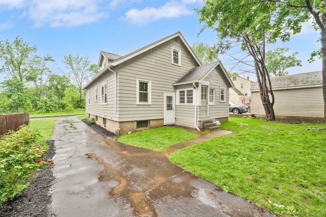 134 Saint Charles St, West Hartford, CT 06119 - back of property with a lawn