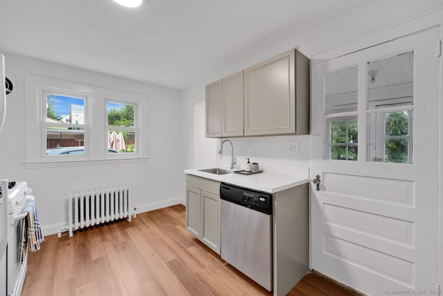 134 Saint Charles St, West Hartford, CT 06119 - kitchen featuring radiator heating unit, dishwasher, a sink, white gas stove, and light wood-style flooring