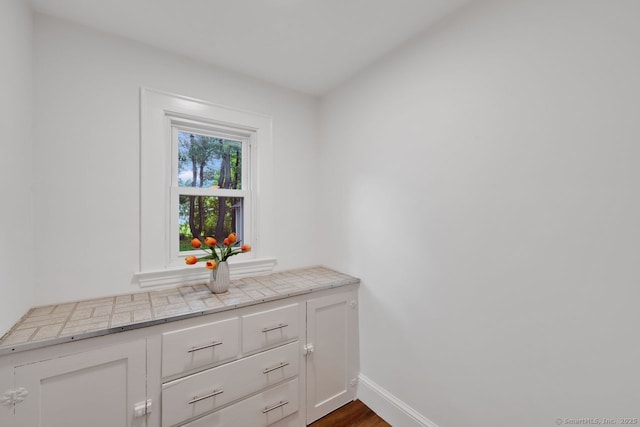 134 Saint Charles St, West Hartford, CT 06119 - bathroom with baseboards and wood finished floors