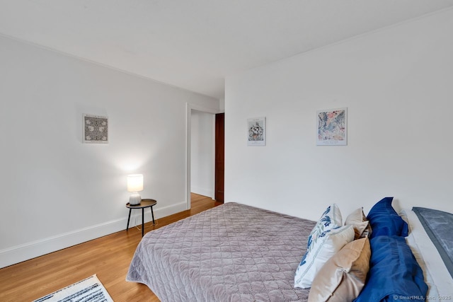 134 Saint Charles St, West Hartford, CT 06119 - bedroom with wood finished floors and baseboards
