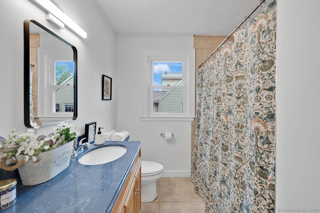 134 Saint Charles St, West Hartford, CT 06119 - bathroom featuring vanity, toilet, tile patterned flooring, a shower with curtain, and baseboards