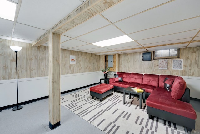 134 Saint Charles St, West Hartford, CT 06119 - living room with a drop ceiling, wooden walls, and tile patterned floors