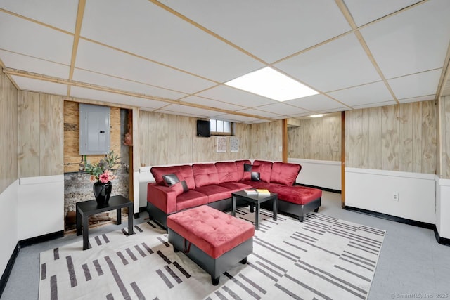 134 Saint Charles St, West Hartford, CT 06119 - living area with electric panel, wood walls, baseboards, and a paneled ceiling