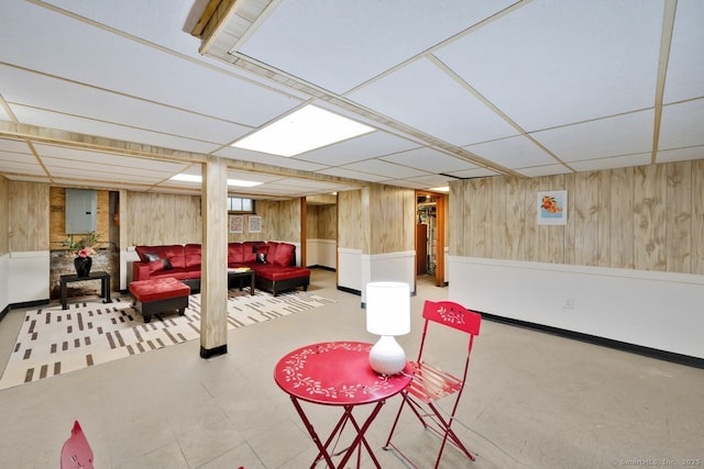134 Saint Charles St, West Hartford, CT 06119 - finished below grade area featuring wooden walls, a paneled ceiling, and electric panel
