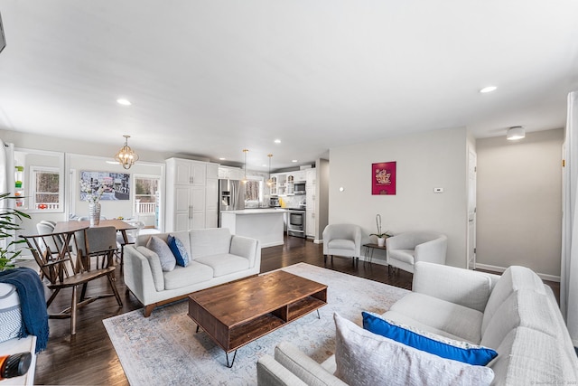 21 White Birch Rd, Redding, CT 06896 - living area with dark wood-style flooring, baseboards, an inviting chandelier, and recessed lighting