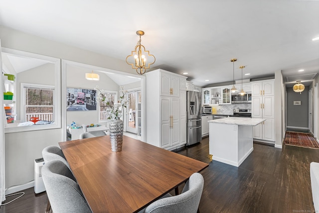 21 White Birch Rd, Redding, CT 06896 - dining room with recessed lighting, an inviting chandelier, baseboards, and dark wood-style floors