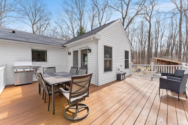 21 White Birch Rd, Redding, CT 06896 - wooden deck featuring area for grilling and outdoor dining area