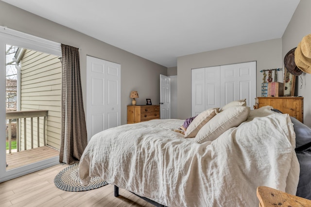 bedroom with a closet and light wood finished floors