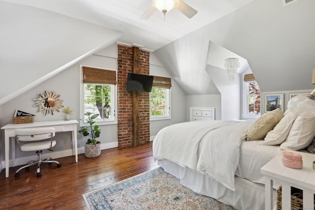 bedroom with hardwood / wood-style floors, a ceiling fan, baseboards, lofted ceiling, and visible vents