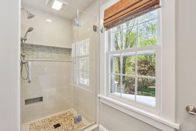 bathroom featuring a shower stall
